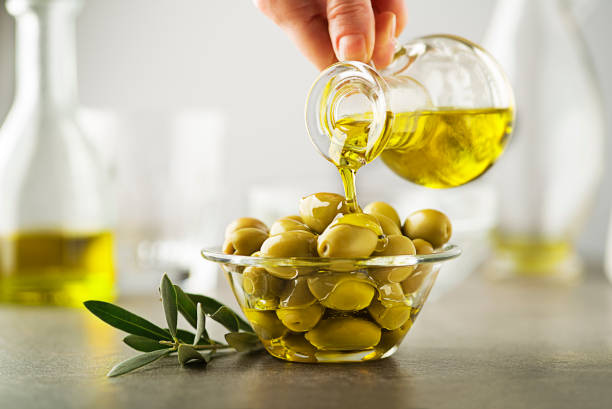 تصویر 2 از روغن زیتون فرابکر اصل با رنگ سبز